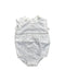 A White Sleeveless Rompers from Fox & Finch in size 3-6M for neutral. (Front View)