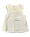 A Ivory Sleeveless Tops from Our Mini Nature in size 4T for girl. (Front View)