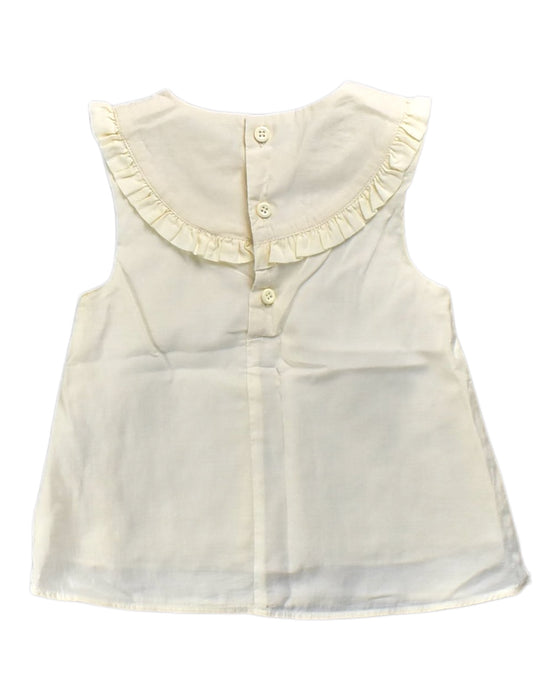A Ivory Sleeveless Tops from Our Mini Nature in size 4T for girl. (Back View)