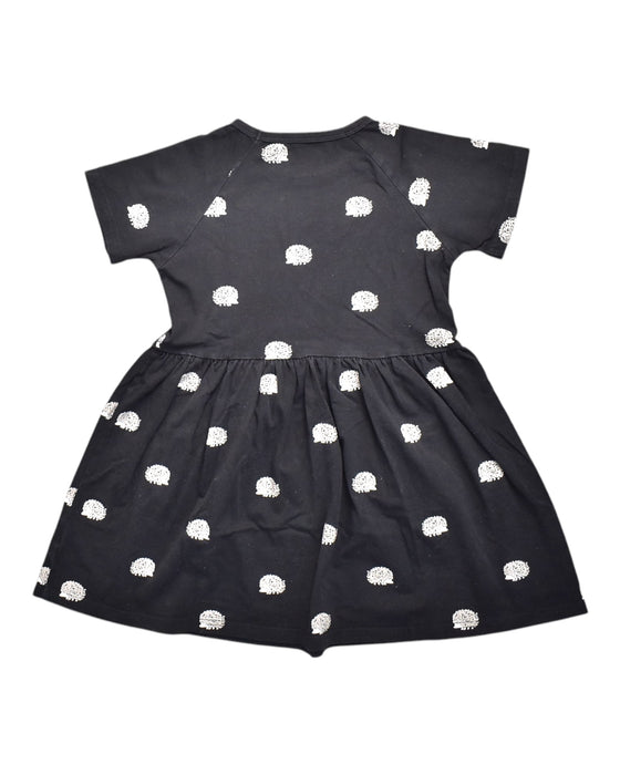 A Black Short Sleeve Dresses from Le Petit Society in size 6T for girl. (Back View)