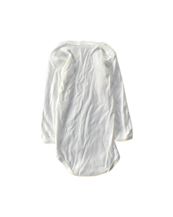 A White Long Sleeve Bodysuits from Petit Bateau in size 12-18M for girl. (Back View)