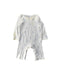 A White Long Sleeve Rompers from The Little White Company in size 3-6M for girl. (Front View)