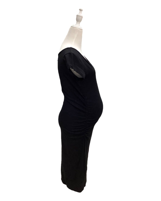 A Black Short Sleeve Dresses from Pea in a Pod in size S for maternity. (Back View)