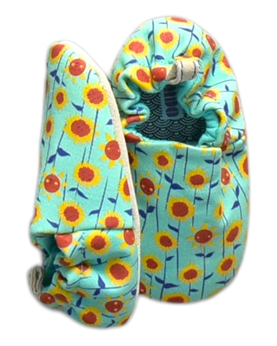 A Multicolour Flats from Poco Nido in size 18-24M for neutral. (Front View)