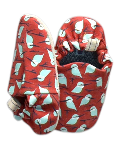 A Red Slippers from Poco Nido in size 18-24M for neutral. (Front View)