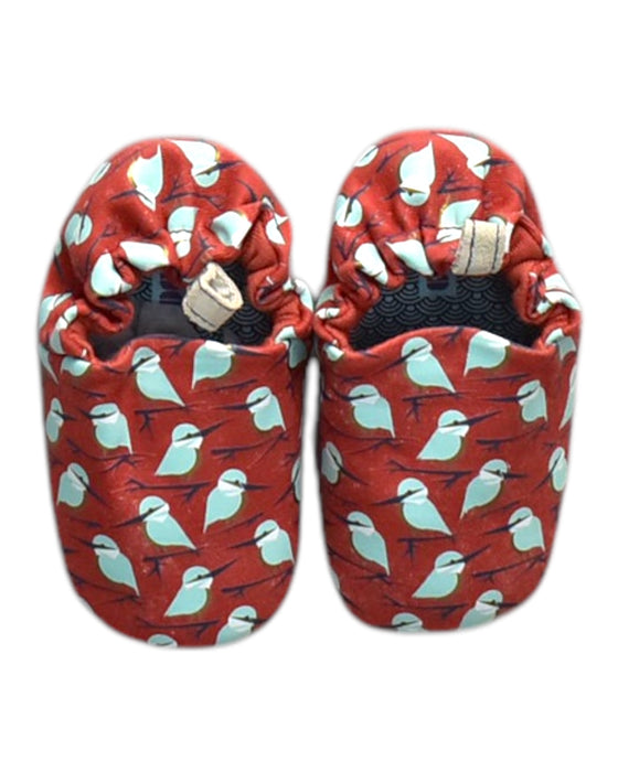 A Red Slippers from Poco Nido in size 18-24M for neutral. (Back View)