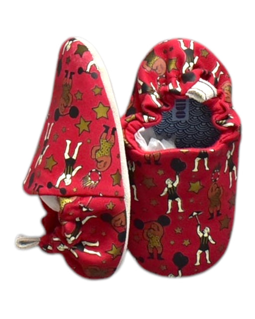 A Red Slippers from Poco Nido in size 12-18M for neutral. (Front View)