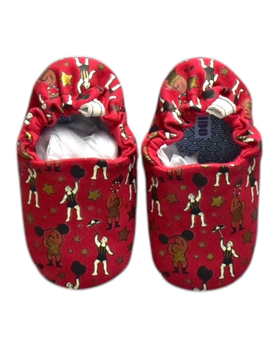 A Red Slippers from Poco Nido in size 12-18M for neutral. (Back View)