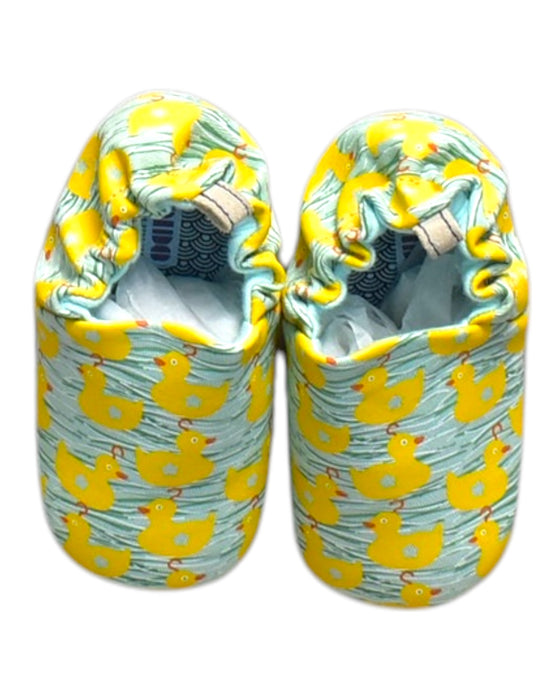A Multicolour Slip Ons from Poco Nido in size 12-18M for neutral. (Back View)