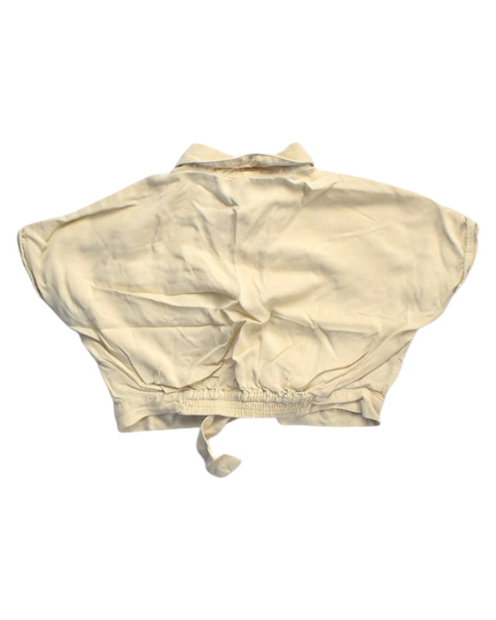 A Beige Short Sleeve Shirts from Gingersnaps in size 4T for girl. (Back View)