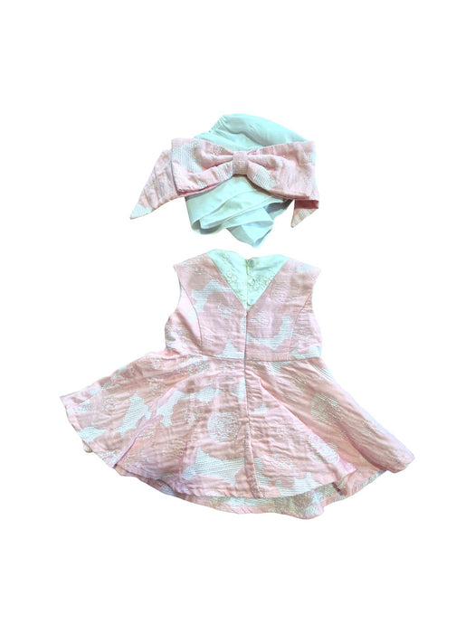 A Pink Sleeveless Dresses from bloomB in size 6-12M for girl. (Back View)