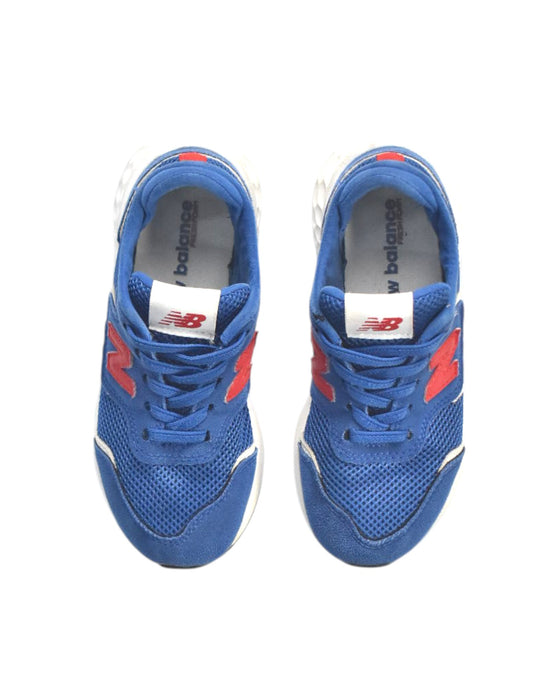 A Blue Sneakers from New Balance in size 6T for boy. (Back View)