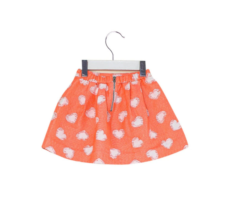 A Orange Short Skirts from Bonpoint in size 4T for girl. (Back View)
