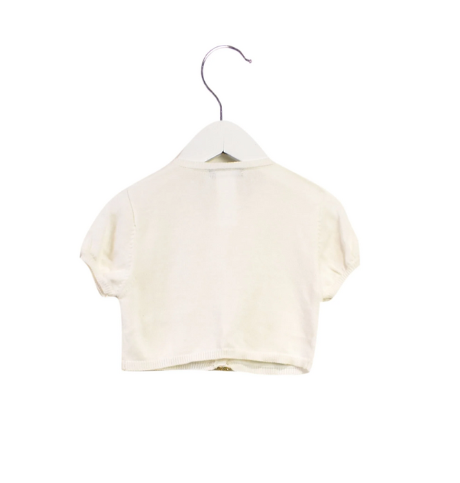 A White Cardigans from David Charles in size 6T for girl. (Back View)