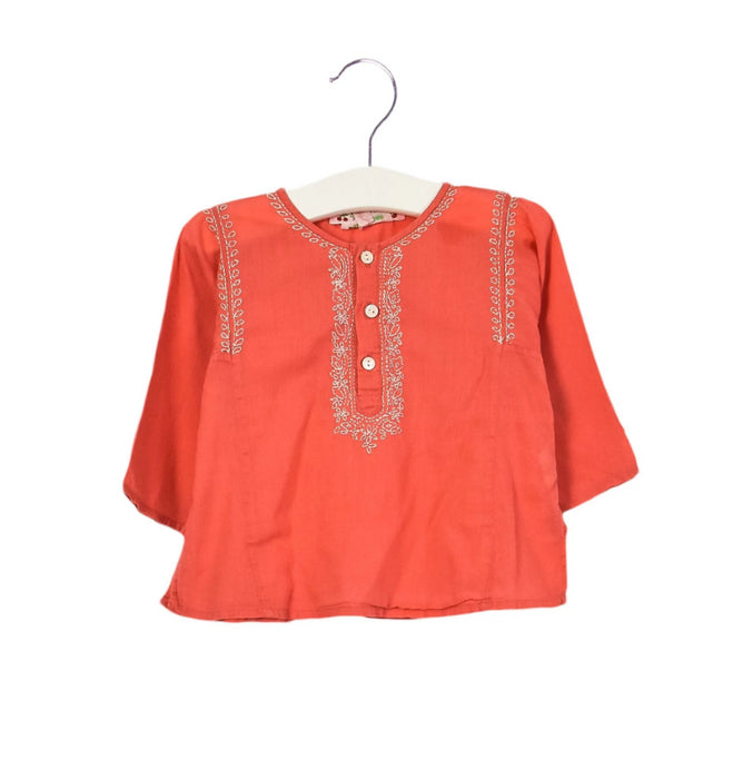 A Orange Long Sleeve Tops from Bonpoint in size 6-12M for girl. (Front View)
