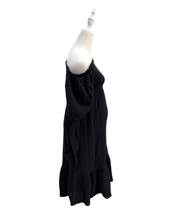 A Black Long Sleeve Dresses from Nothing Fits But in size Maternity-M for maternity. (Back View)
