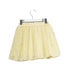 A Ivory Short Skirts from Bonpoint in size 4T for girl. (Back View)