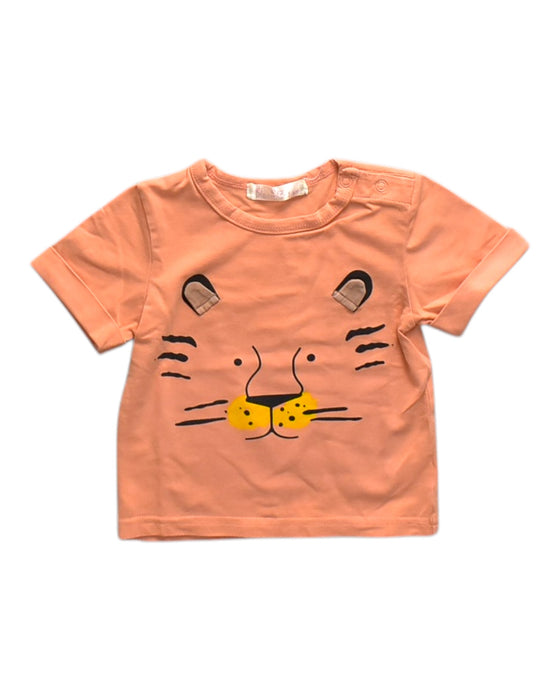 A Peach Short Sleeve T Shirts from bloomB in size 3-6M for neutral. (Front View)