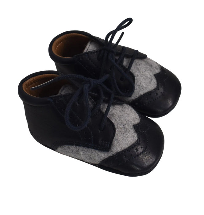 A Navy Boots & Booties from Pom d’Api in size 6-12M for boy. (Back View)