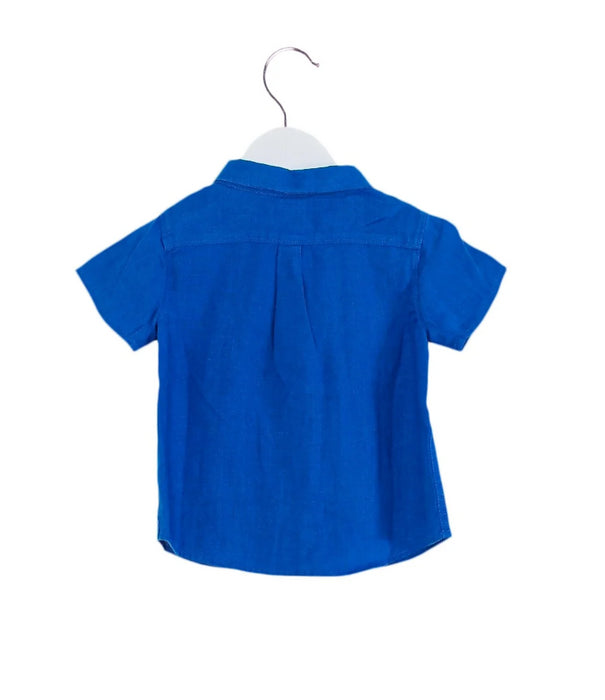 A Blue Shirts from Petit Bateau in size 6-12M for boy. (Back View)