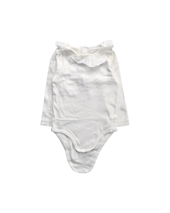 A White Long Sleeve Bodysuits from Jacadi in size 12-18M for girl. (Front View)