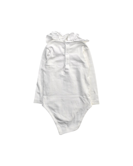 A White Long Sleeve Bodysuits from Jacadi in size 12-18M for girl. (Back View)