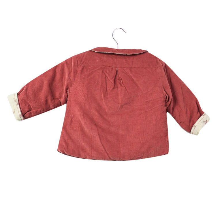 A Pink Lightweight Jackets from CdeC in size 3-6M for girl. (Back View)