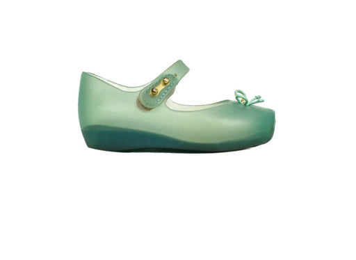 A Green Flats from Mini Melissa in size 12-18M for girl. (Front View)