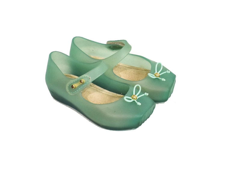 A Green Flats from Mini Melissa in size 12-18M for girl. (Back View)