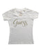 A White Short Sleeve Tops from Guess in size 7Y for girl. (Front View)
