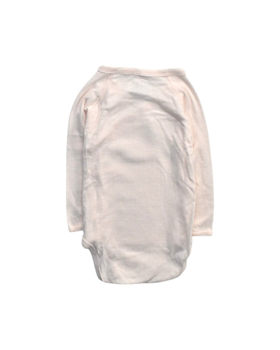 A Ivory Long Sleeve Bodysuits from Petit Bateau in size 12-18M for girl. (Back View)