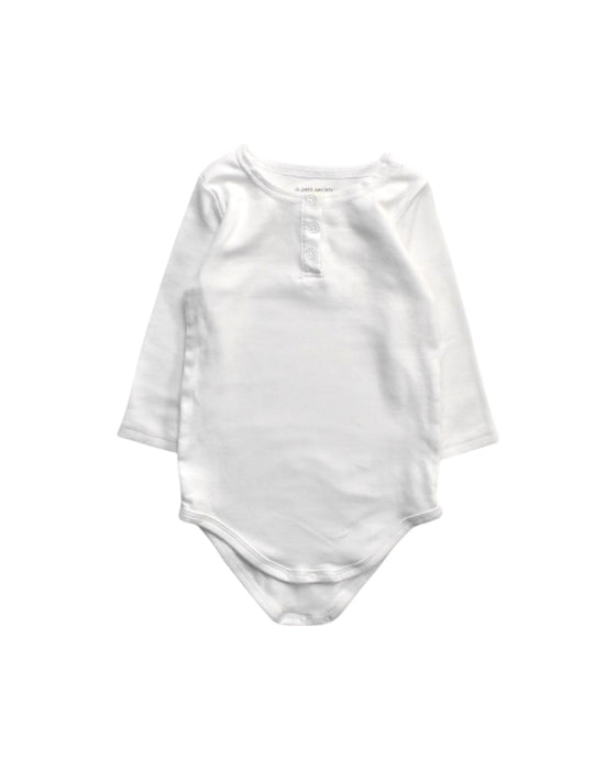 A White Long Sleeve Bodysuits from Le Petit Society in size 18-24M for neutral. (Front View)