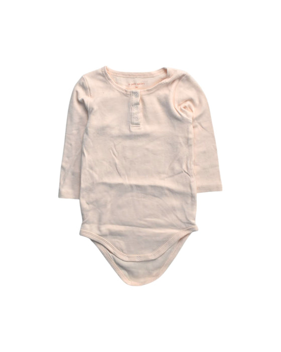 A Ivory Long Sleeve Bodysuits from Le Petit Society in size 18-24M for girl. (Front View)
