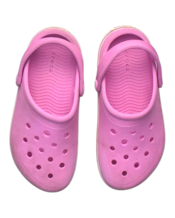 A Pink Slip Ons from Crocs in size 6T for girl. (Back View)