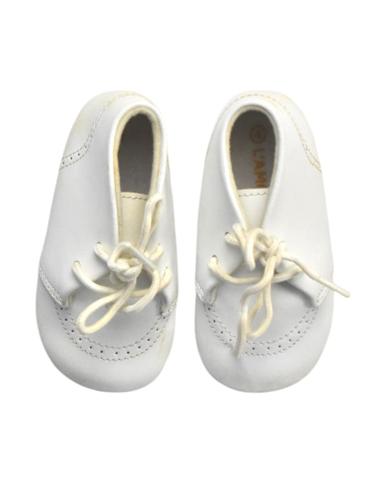 A White Booties from L'Amour in size 12-18M for girl. (Back View)