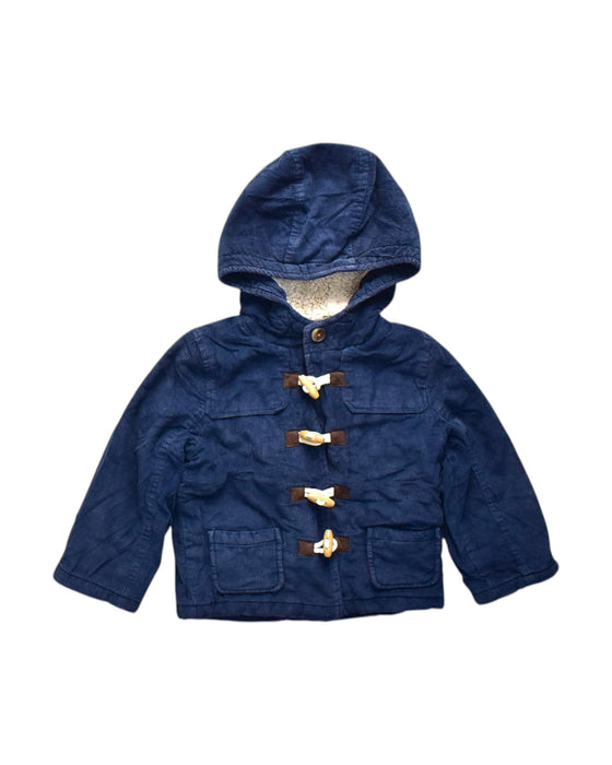 A Navy Coats from Baby Boden in size 3T for boy. (Front View)