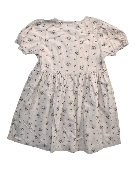 A Ivory Short Sleeve Dresses from Newbie in size 7Y for girl. (Back View)