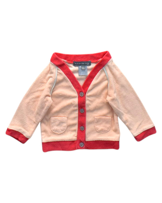 A Peach Cardigans from Milk on the Rocks in size 6-12M for neutral. (Front View)