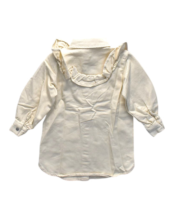 A Ivory Long Sleeve Shirts from Seed in size 2T for girl. (Back View)