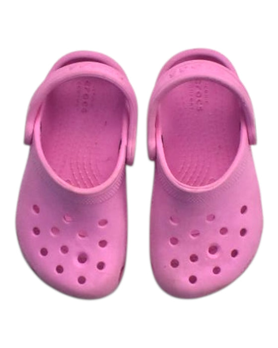 A Pink Slip Ons from Crocs in size 18-24M for girl. (Back View)