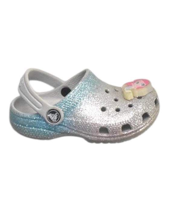 A Silver Slip Ons from Crocs in size 3T for girl. (Front View)