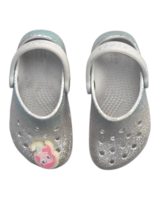 A Silver Slip Ons from Crocs in size 3T for girl. (Back View)