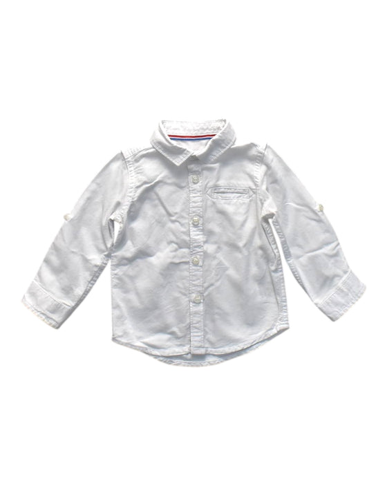 A White Long Sleeve Shirts from Mothercare in size 6-12M for boy. (Front View)