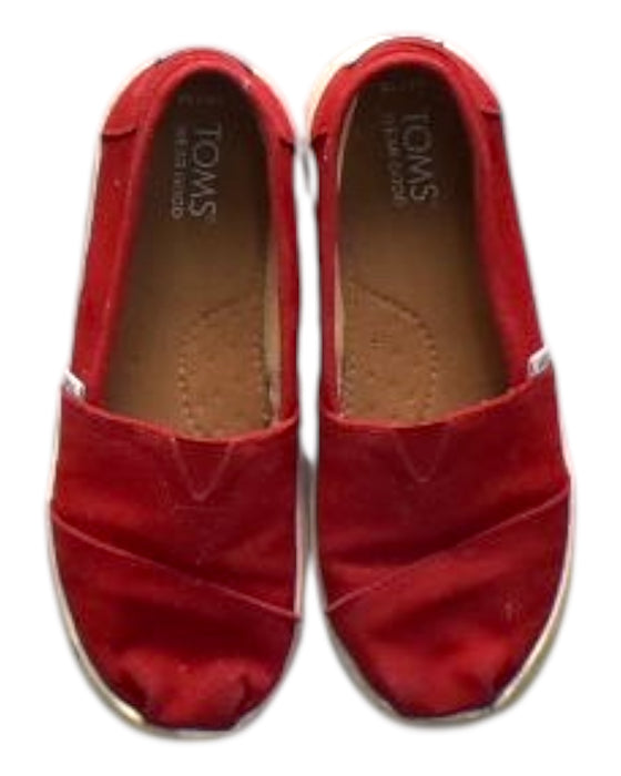 A Red Slip Ons from Toms in size 6T for neutral. (Back View)