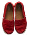A Red Slip Ons from Toms in size 6T for neutral. (Back View)