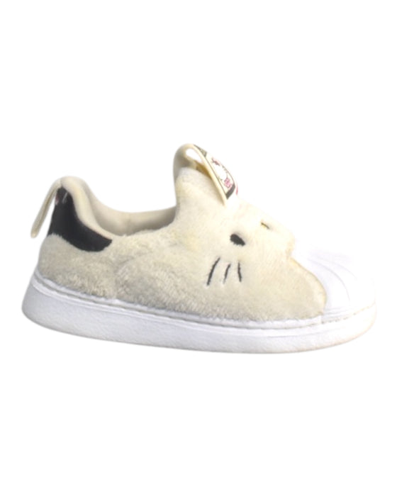 A White Sneakers from Adidas in size 12-18M for girl. (Front View)