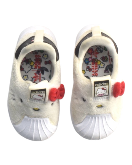 A White Sneakers from Adidas in size 12-18M for girl. (Back View)