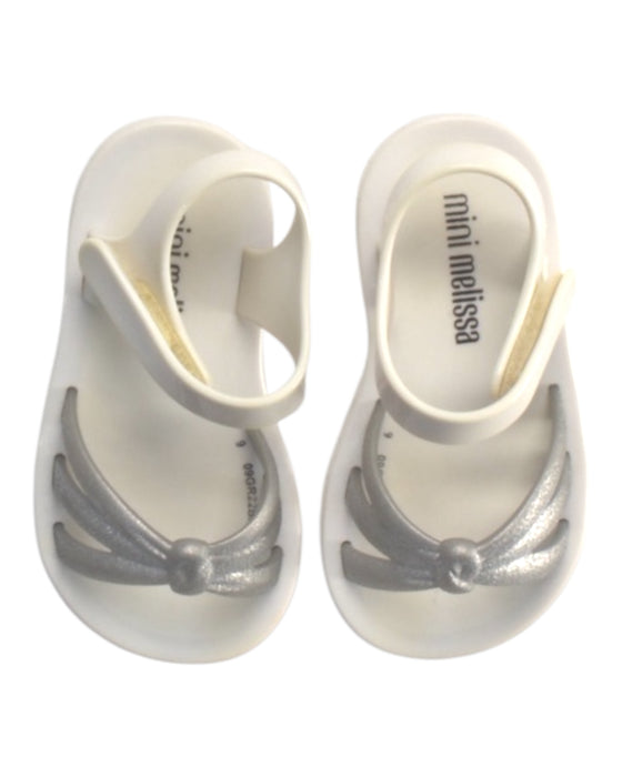 A Silver Sandals from Mini Melissa in size 12-18M for girl. (Back View)