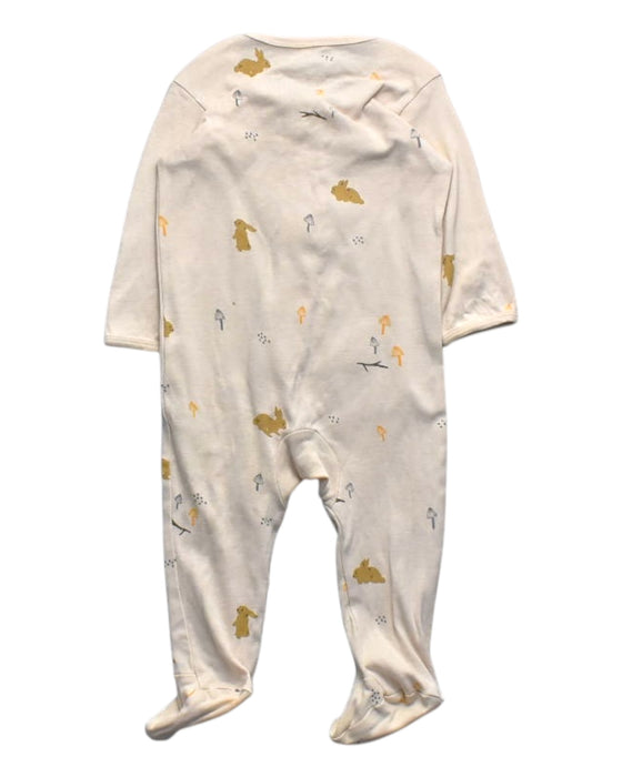 A Ivory Onesies from Le Petit Society in size 6-12M for girl. (Back View)