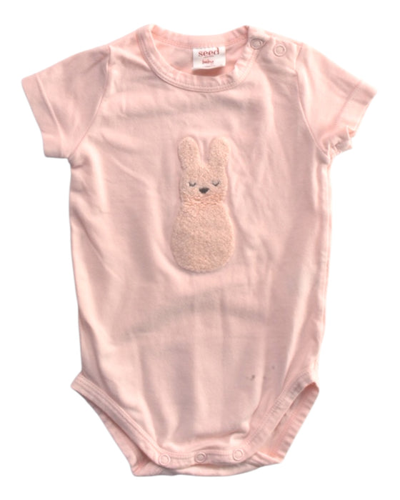 A Pink Short Sleeve Bodysuits from Seed in size 0-3M for girl. (Front View)